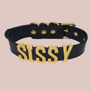 The black Sissy collar with gold lettering and fastenings.