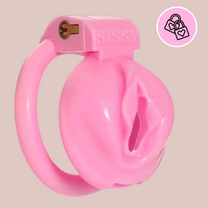 An angled view of The Sissy Pussy Chastity Cage from House Of Chastity. This is a pink cage that comes in a large or small size.