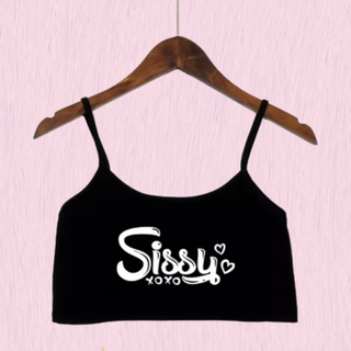 The black crop top camisole from House Of Chastity, shown on a hanger, you can see bold white Sissy xoxo lettering.