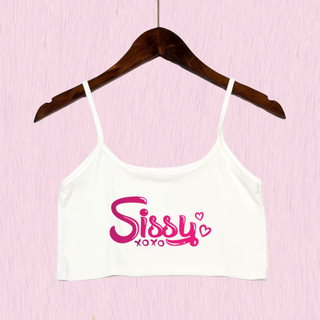 The white crop top camisole from House Of Chastity, shown on a hanger, you can see bold pink Sissy xoxo lettering.