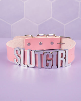 A picture of the slut girl collar in pink.