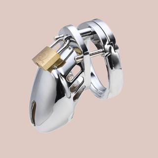 A close up of the 600HOC steel chastity cage, you can see the fully assembled chastity device with its padlock in place.