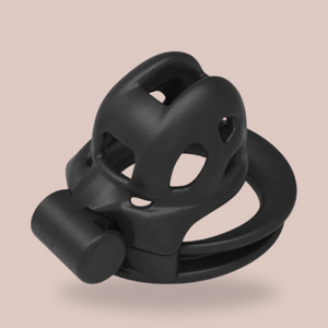 An angled view of the black Super Mini Cobra Double Cuff, it is shown here sitting on its base with the cage facing up.