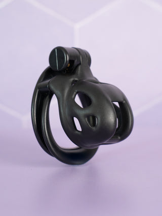 The Super Mini Cobra Double Cuff shown here in black, it is shown fully assembled with its base ring and integral lock in place.