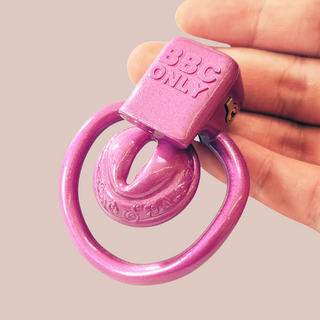 A close up of the BBC Only Super Sissy Pussy Chastity Cage from House Of Chastity, it is a micr chastity cage with an integral lock, which is shown fully assembled.