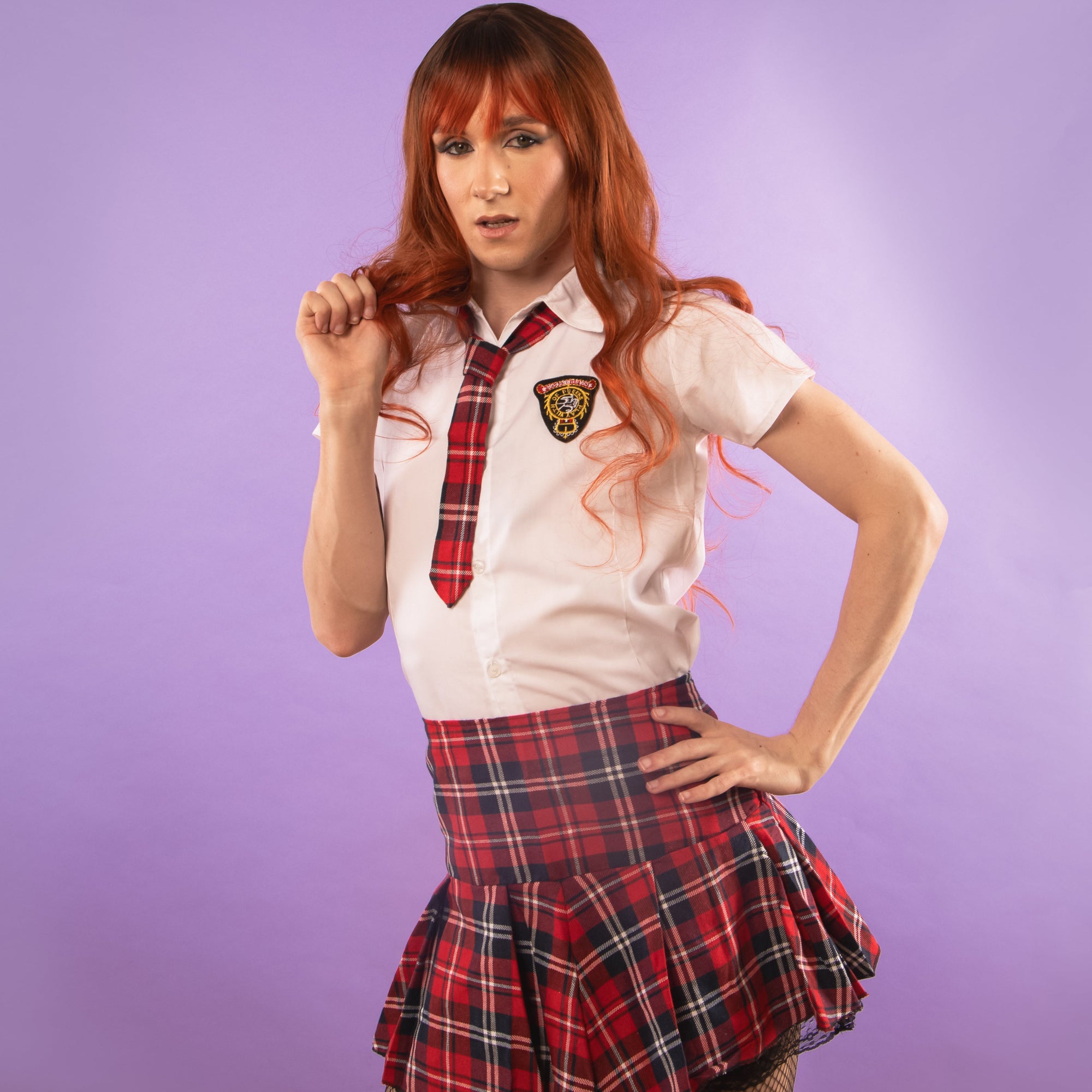 This uniform comes with a blouse, skirt, tie and pinnable badge.