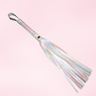 The flogger is shown lying out flat, the iridescent colours can be seen