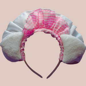 The frilly headband of The Bella Maids Dress, you can see that it has gingham detailing and soft ears.