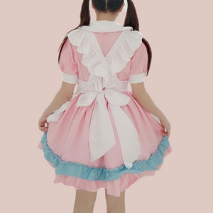 A back view of The Betsy Lou dress for men, it shows the pink dress, blue frill layer and cross over style of full white frilled apron.