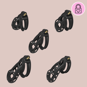An image of The Cobra Double Cuff Matte Black from House Of Chastity. Here we see from top left the Nub, top right the Nano, in the middle is the Small, bottom right is the Standard and bottom right is the Maxi size.