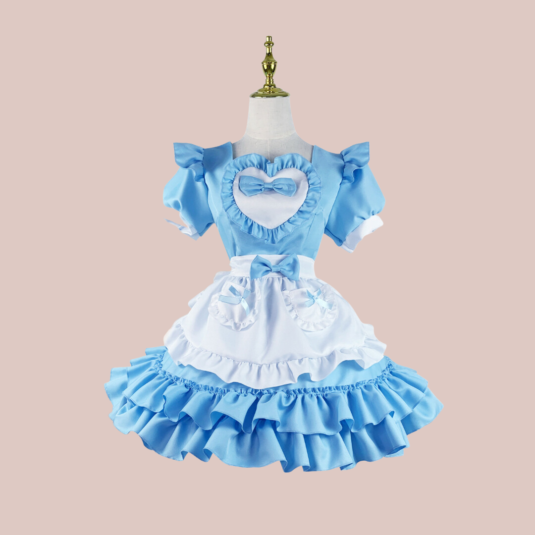 The florence blue frilly dress, a pretty fitted dress with two layers of frills to the skirt, ruched puffed sleeves, large heart detail to the chest and white frilled half apron with blue bow accents.