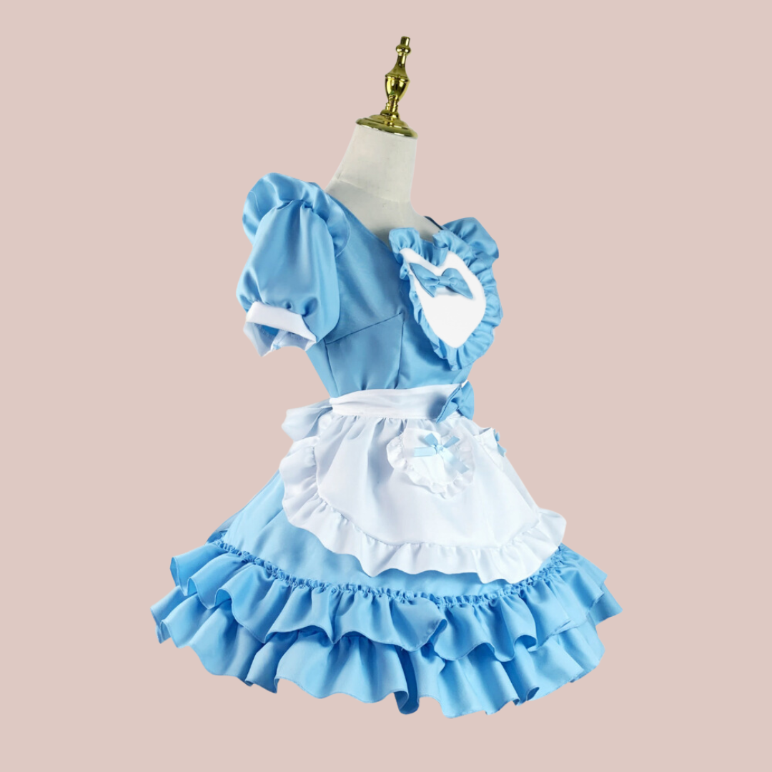 The florence blue frilly dress, a pretty fitted dress with two layers of frills to the skirt, ruched puffed sleeves, large heart detail to the chest and white frilled half apron with blue bow accents.