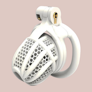 The white version of The Hive from House Of Chastity is shown from the side view fully assembled. You can see the close up of the hole design that runs throughout the cage.