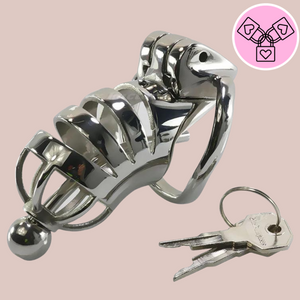 The JJ from House Of Chastity, shown fully assembled, with the urethral tube fixed in place and the 2 keys that come with the device.