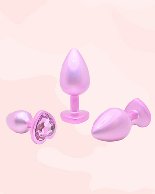 Three different angles of the pearl butt plugs.