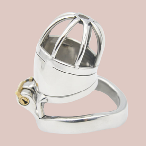 An alternate view of the small metal chastity cage with a solid shaft like centre and open bar work design to the end. The cage is shown connected to its base ring, which allows the integral lock to be fitted.