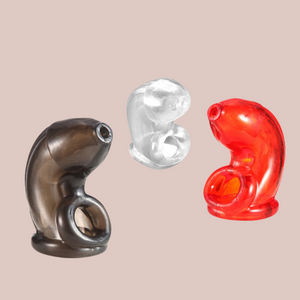 Soft Slide On Chastity, available in three colours and showing the black, transparent and red cages.