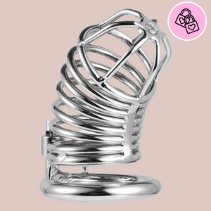 a close up of the silver coil chastity cage, it is stood on the base ring and shows the coiled spring body and domed barred head.