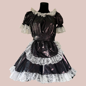 The Tammy metallic black dress is shown from the front with its apron in place. Our swing style tulle petticoat is showing off the fullness of the skirt to great effect.