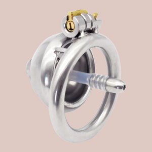 A rear view of the Ultra Urethral Chastity Cage, showing the back of the chastity cage, the urethral insert showing how it will enter the body and the integral lock in place.
