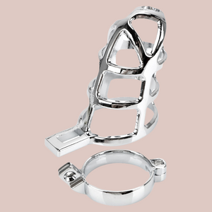Shown with the base separated and no lock in place, Made from zinc alloy this chastity cage has a very bright silver look to it, the design to the cage is very web like, hence the name.