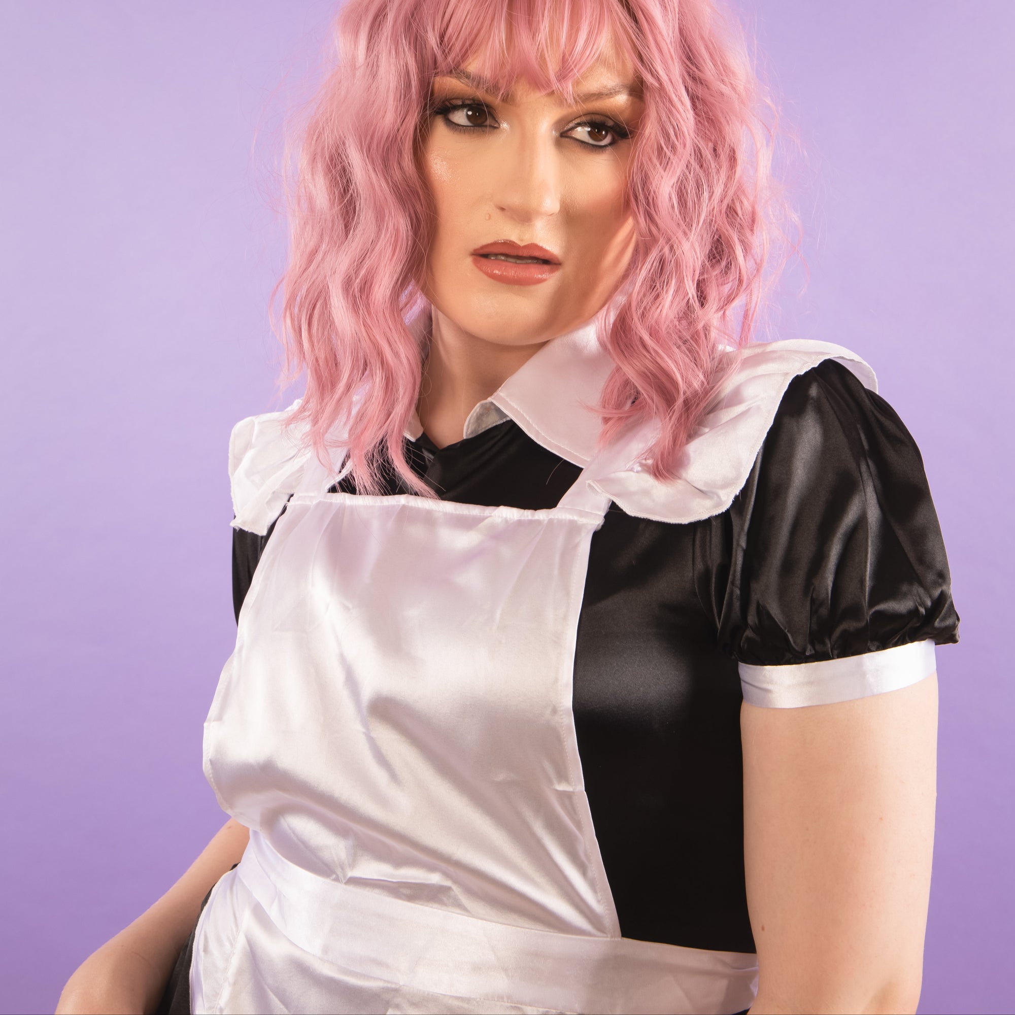 The soft satin cap sleeves compliment the dress with the two tone look.