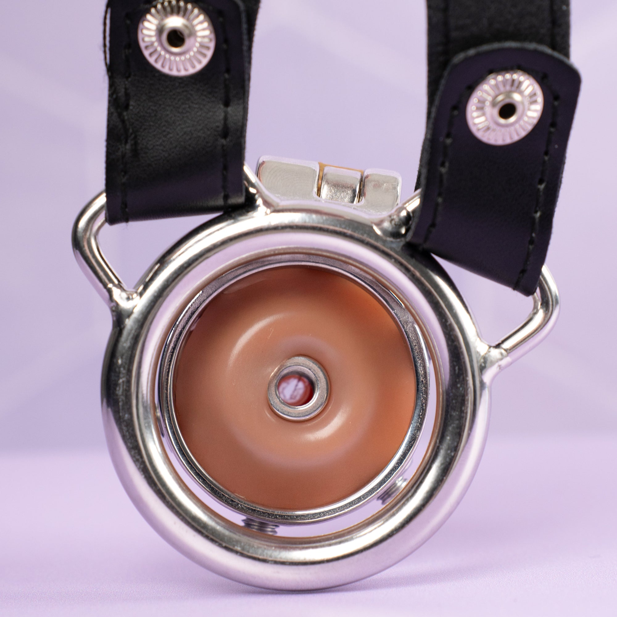 A rear view of the , you can see the base ring and the silicone pussy.
