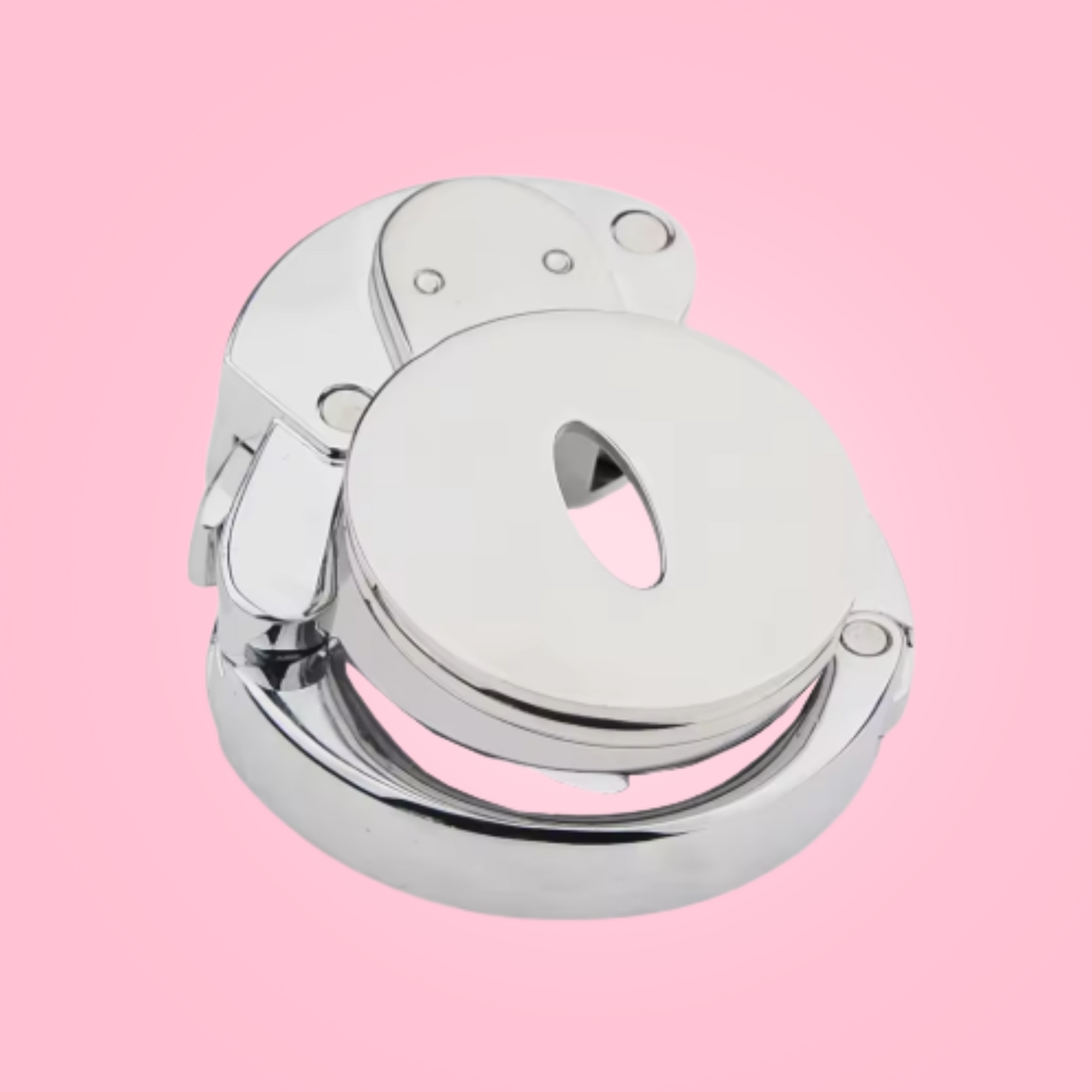 an angled view of The Bridewell Adjustable Base Ring Chastity Cage, the base ring is locked in place.