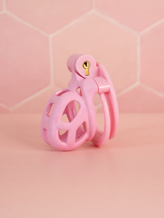A side view of the Cobra Double Cuff, showing is the pink nub version of this device, it is shown fully assembled.