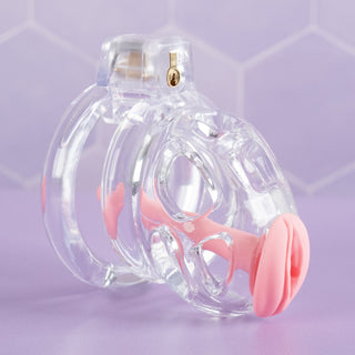 A side view of the transparent chastity cage, you can see the integral lock is fitted to the front of the cage for ease of use.