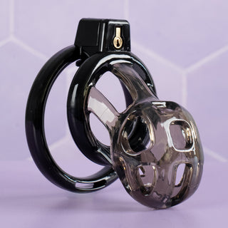 an angled view of the black chastity cage, the cage is made from medica grade silicone and the base rings are made from ABS.
