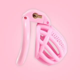 A side view of The Detained Small in pink, it is fully assembled with the base ring and integral lock in place.
