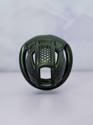A front on view of the cage, the open urination hole at the base can be clearly seen.