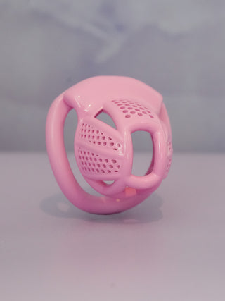 The Detained V2 Nub is shown here in pink on a pale grey background