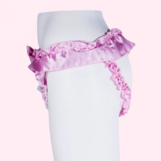 A side view of the Gossamer Guard chastity belt, it is shown on a static model.