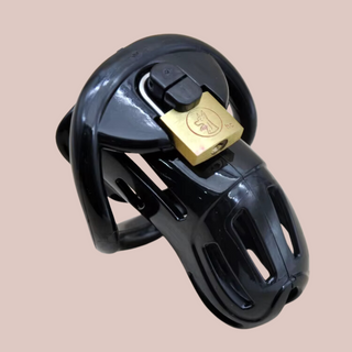 The black Loc'd chastity device, shown assembled and with its padlock locked in place. The clever padlock design of the cage can be seen, it allows the padlock to sit flat to the cage.