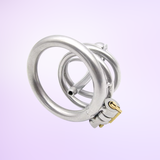 An internal view of the Lock Up Small Chastity Cage, it is shown on a purple background