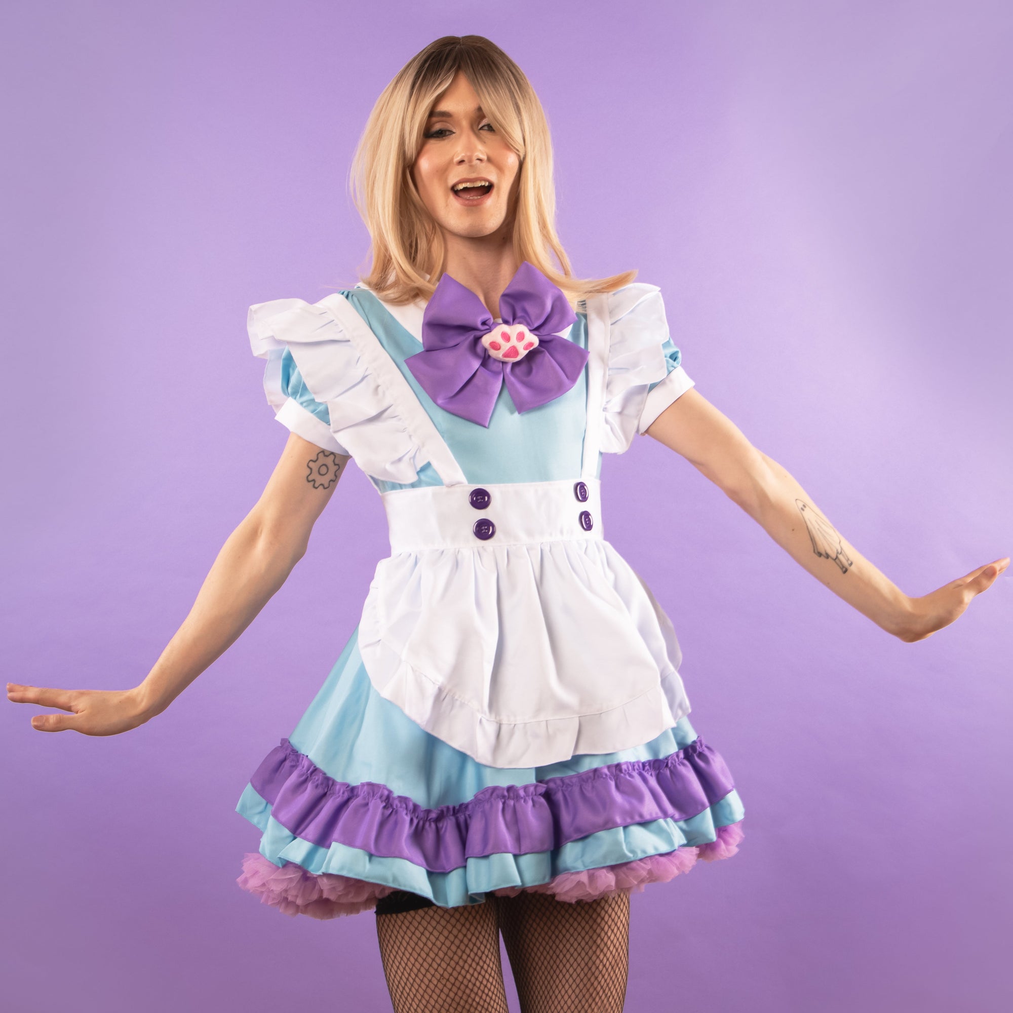 The dress is shown with a swing style petticoat underneath.
