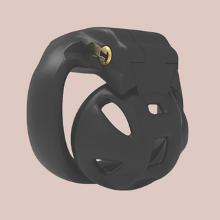 A side view of the mamba Nub chastity device, it shows the profile of body of the cage, the base ring , and you can see how the ring and cage fit together with the lock then slotted into place.