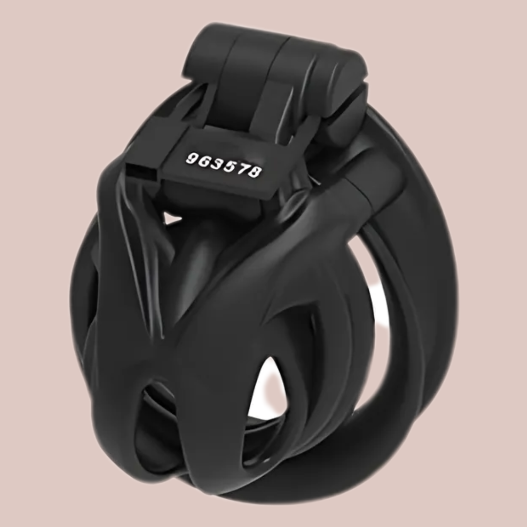 A side view of the Python  Nano chastity cage from House Of Chastity, it is fully assembled into its double cuff style base ring and the integral lock is fixed in place.