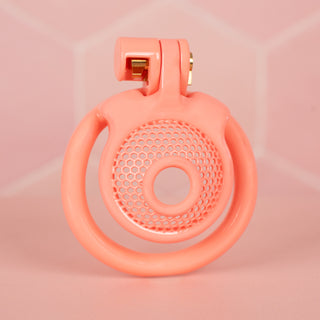 The Snare Chastity Cage is a micro chastity cage with a mesh front and circular urination hole.