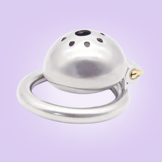A side view of the chastity cage, you can see the domed shape, space between the cage and base ring.