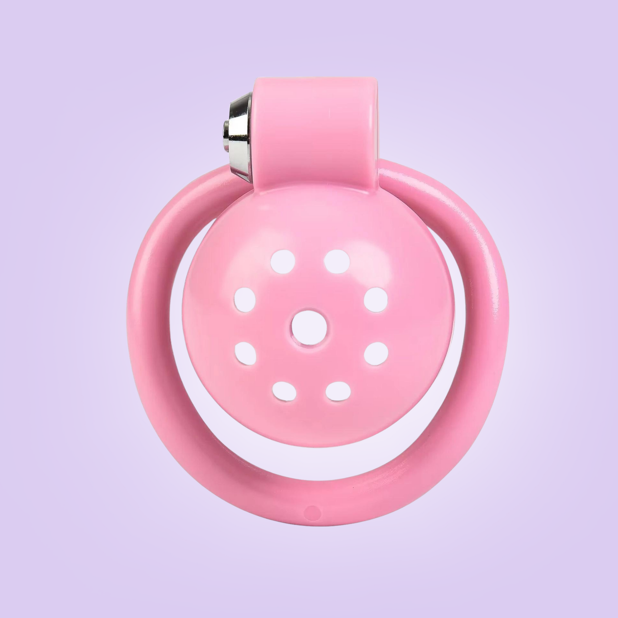 The Ultra Lightweight Chastity cage is shown here in its pretty pink colour and the easy push lock on the side.