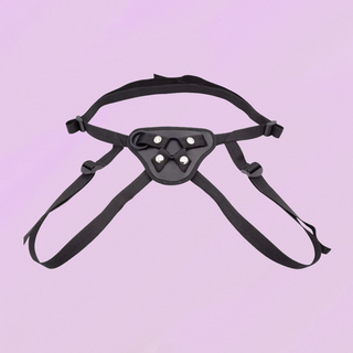 The black strap on with all of the straps extended to show that they can be adapted to different sizes