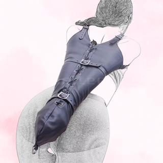 An angled view of the arm shackle, it is shown on a soft pink background