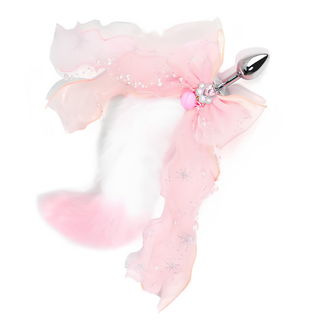 The pink and white soft fluffy tail with pink bow, paw print and bell.