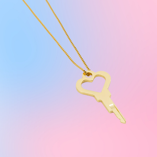 An angled look of the delicate key with heart cut out design.