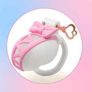 The key and padlock being used on a chastity cage.