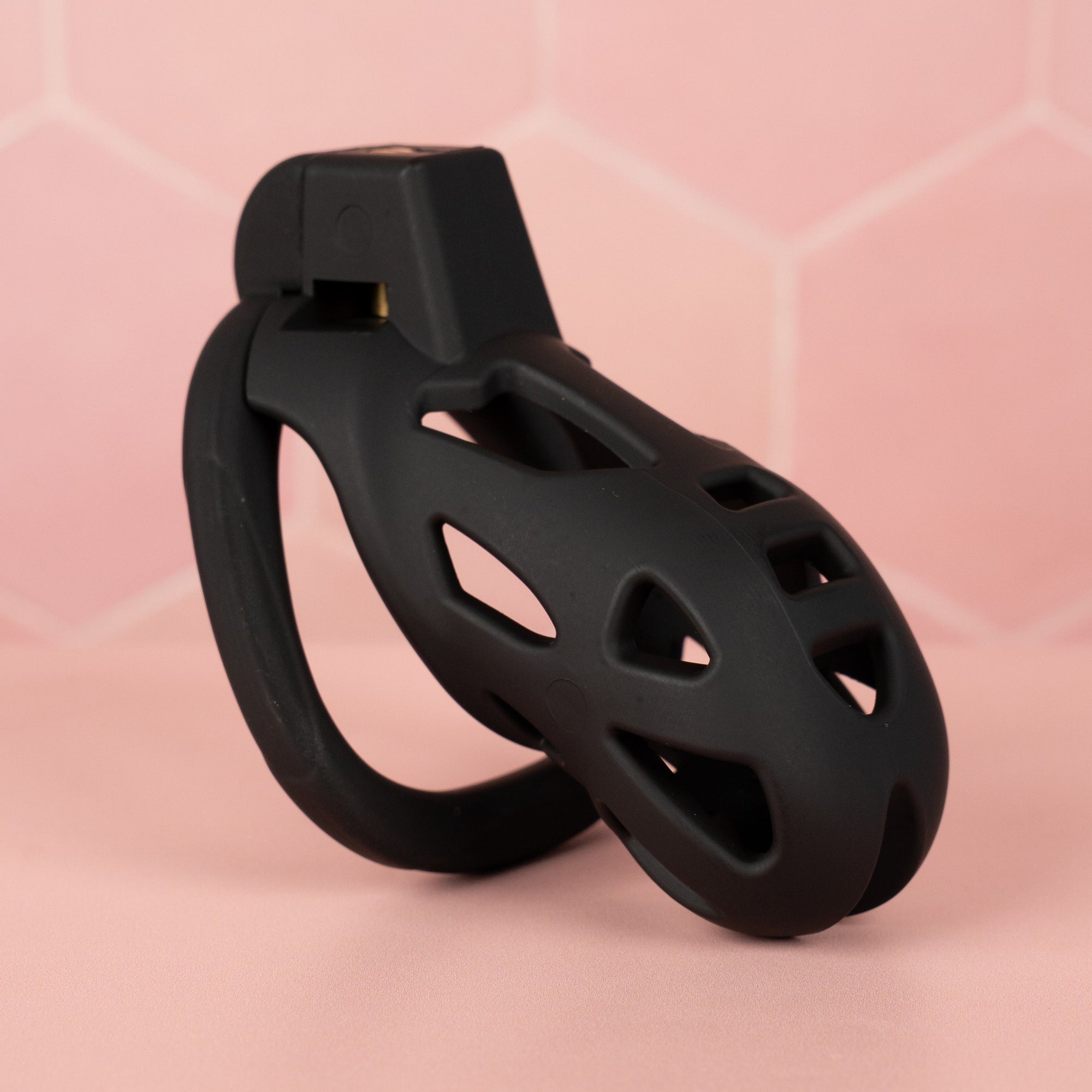 The Jeusn Smooth Chastity Cage shown here fully assembled, the cut out design and ABS material make is breathable.
