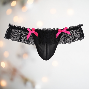 Low rise hip style knickers with deep lace skirt, penis pouch and two decorative pink bows.